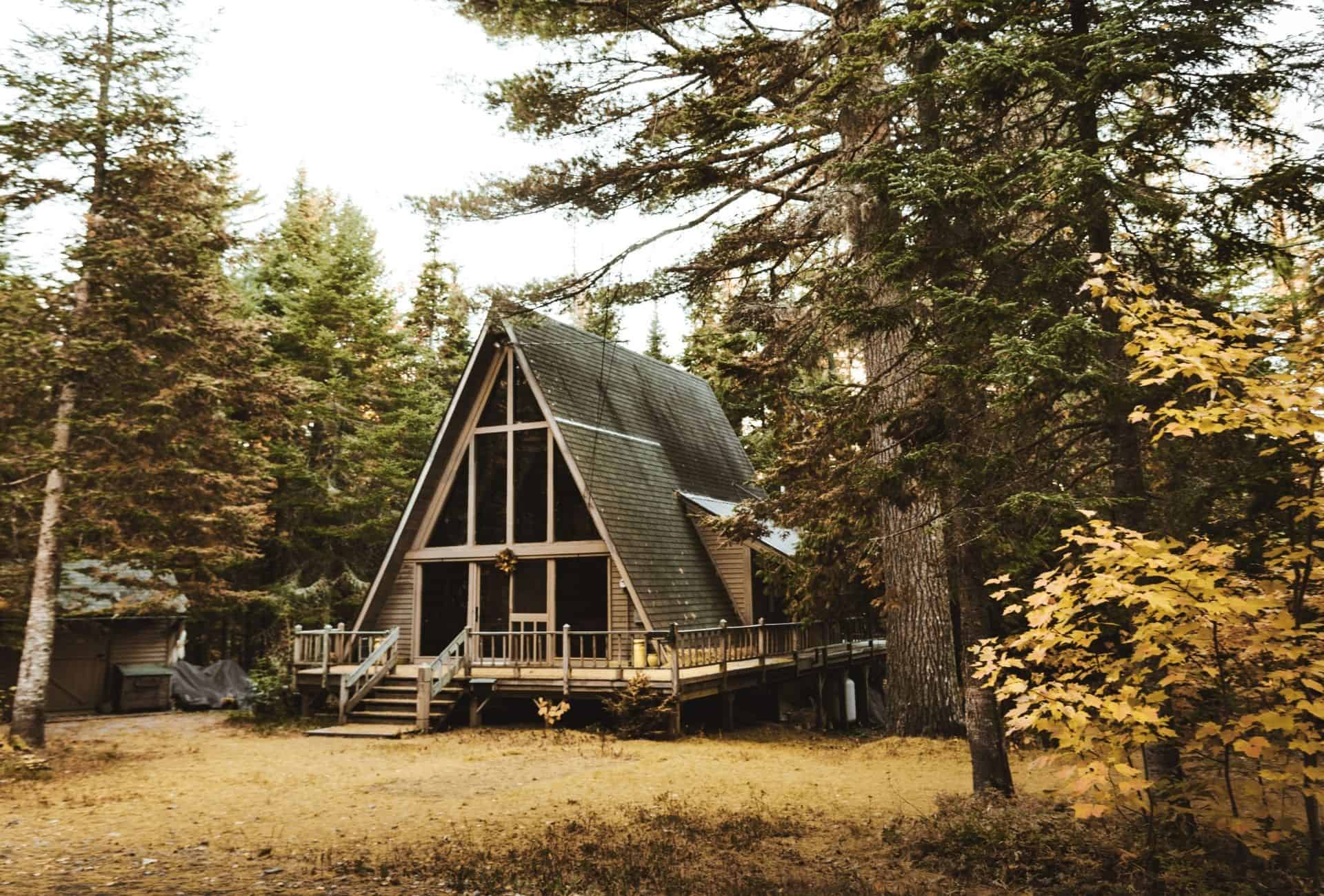 A-frame cabin in the woods.