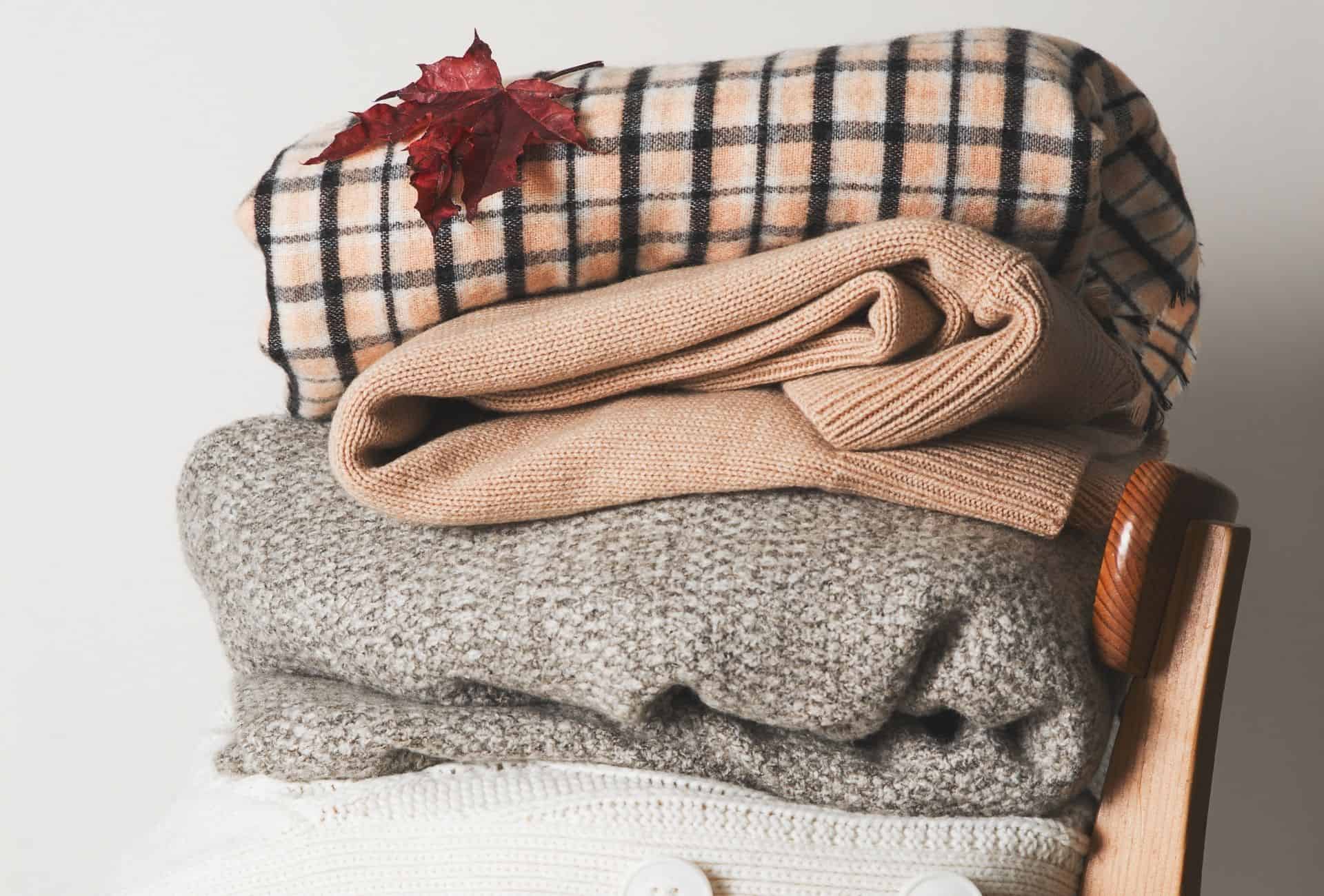 Layered clothes on a chair.